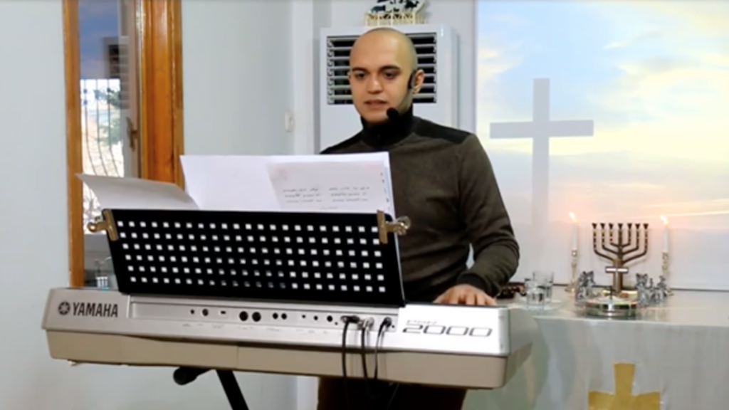 Persecuted Christian leads worship