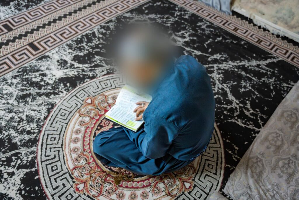 a persecuted Christian prays on the International Day of Prayer