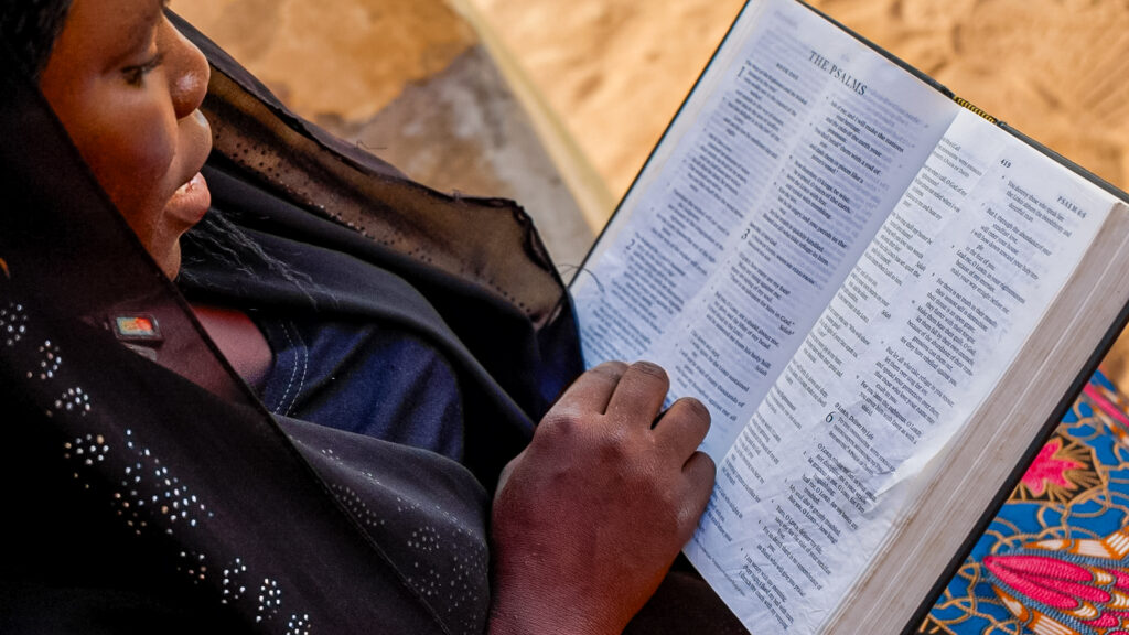 Nigerian woman reading bible - Global christian relief