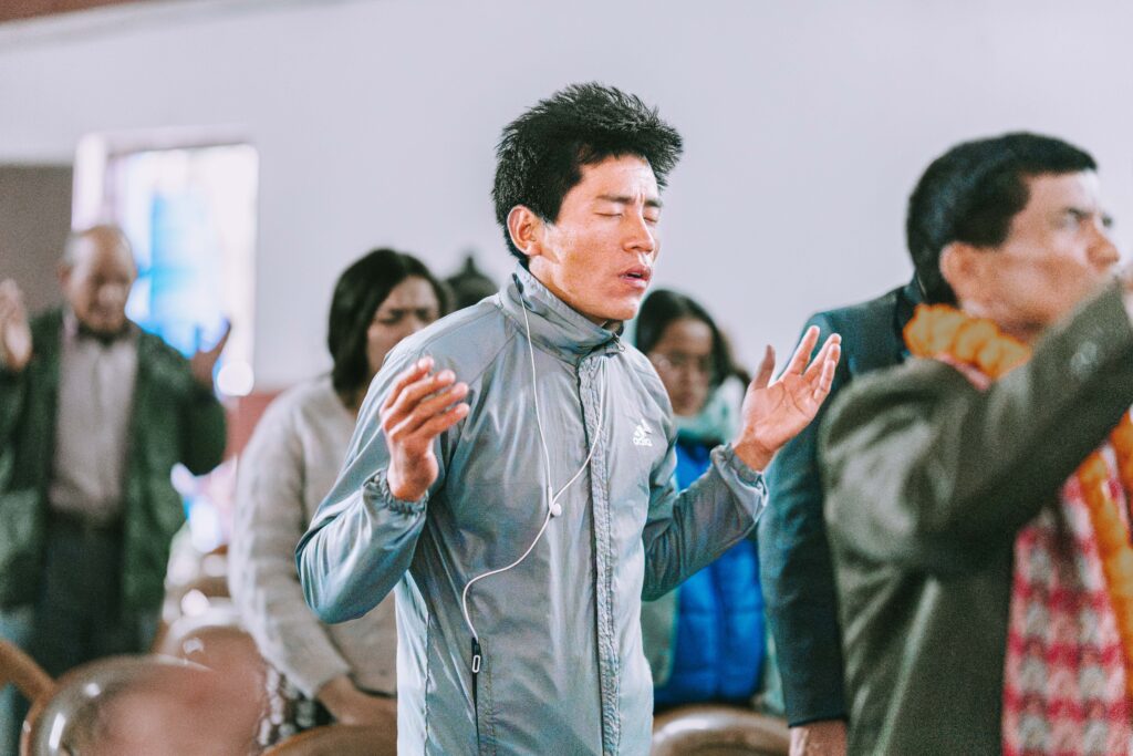 A man worships at church as the international day of prayer for the persecuted church approaches