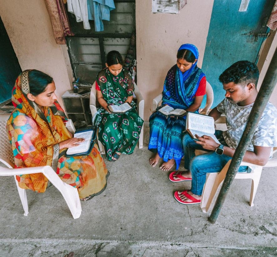 Suman - Indian Christian Reading bible with believers