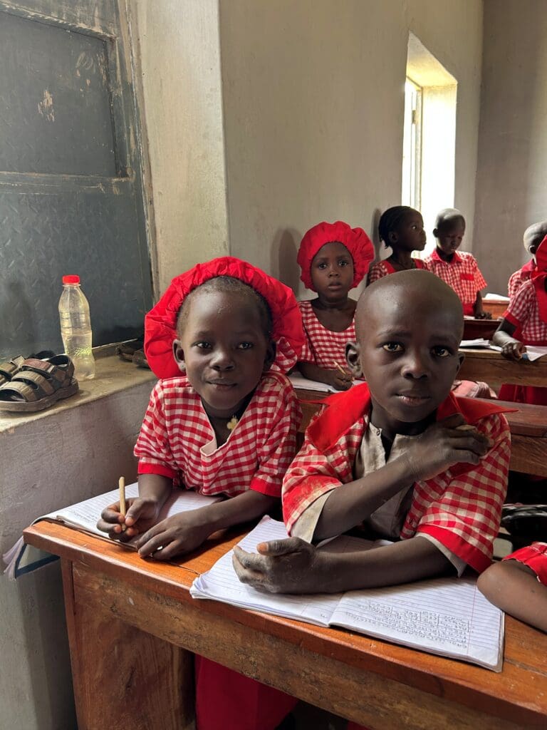 Children at school inside IDP camp