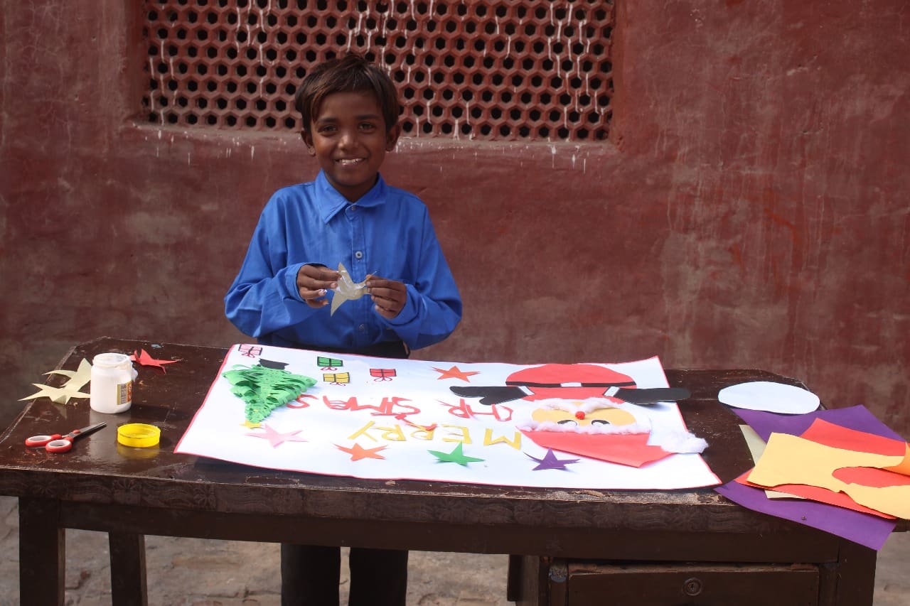 John, a student at a school in Pakistan run by GCR's partners