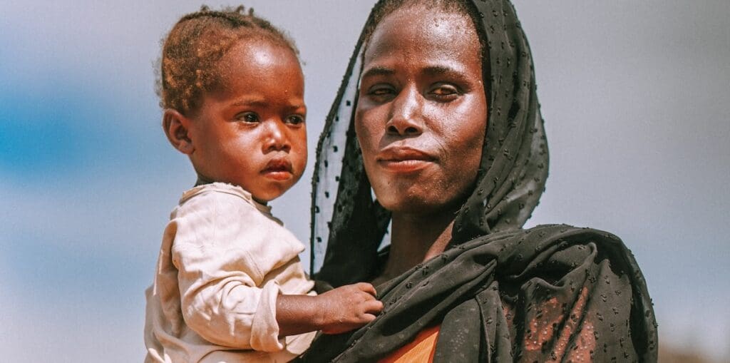 A Nigerian Christian mother and her child, driven from their home by persecution
