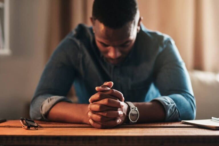 Young man praying