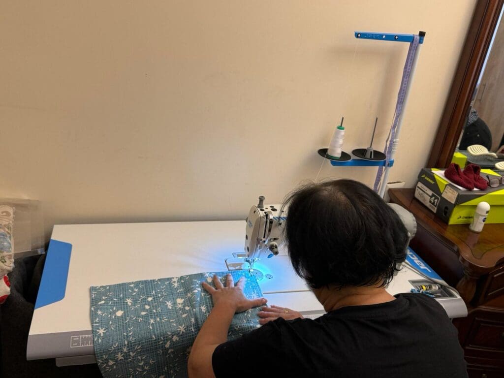 Woman sewing, Armenia livelihood project